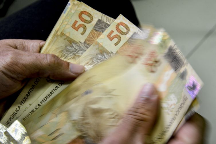 Caixa termina de pagar parcela de março do novo Bolsa Família